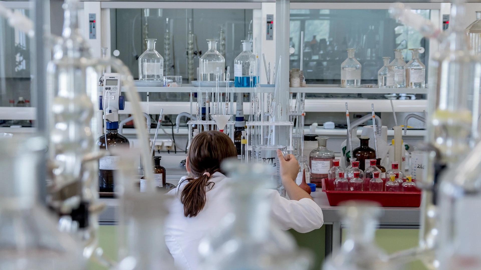Analytical chemist testing resin viscosity and titration in PureEpox quality control laboratory